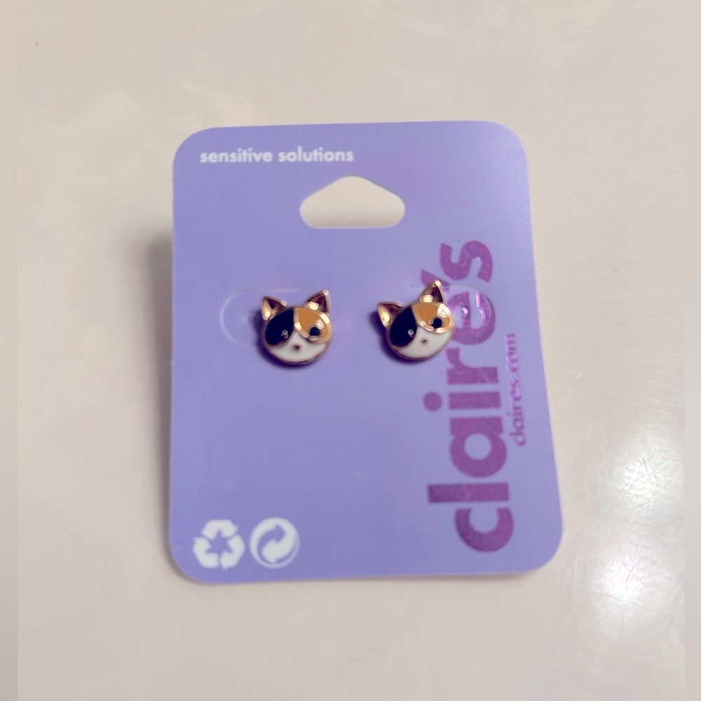 Claire’s cat earrings. New, never worn.